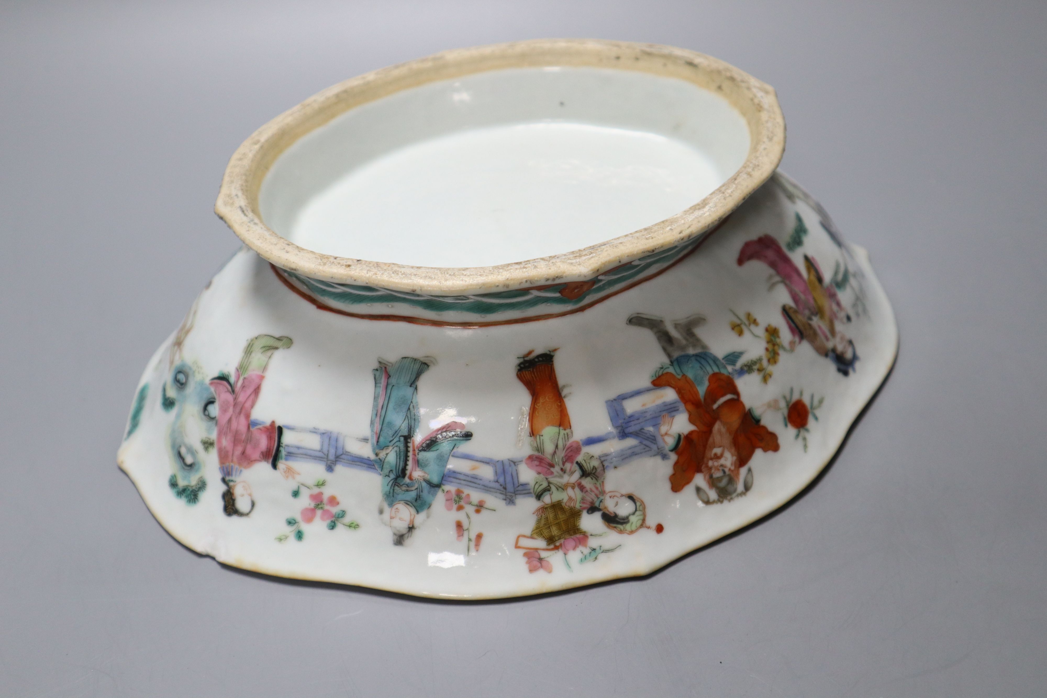 A Chinese dish, length 26cm and two soapstone pots